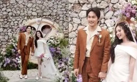 Vợ chồng Đình Tú - Ngọc Huyền gây sốt với visual ngày cưới, cô dâu khoe vai trần cuốn hút khó rời mắt