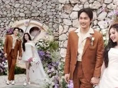 Vợ chồng Đình Tú - Ngọc Huyền gây sốt với visual ngày cưới, cô dâu khoe vai trần cuốn hút khó rời mắt